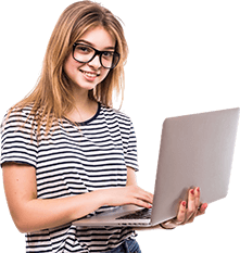 Young professional woman using a laptop, representing ERPOcean cloud ERP software for modern business management.