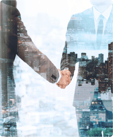 Business professionals shaking hands with cityscape overlay, symbolizing corporate partnership